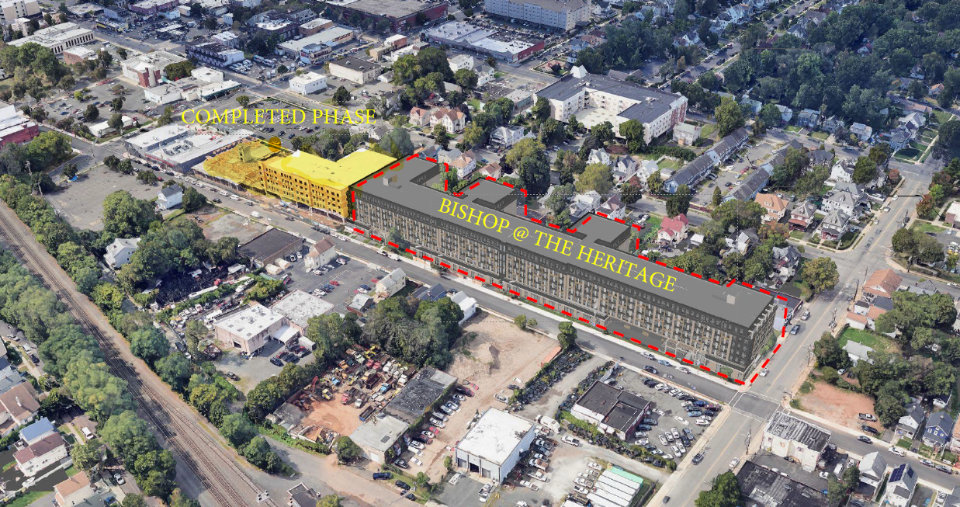 Aerial view of the project showing the completed phase with a rendering of the Bishop at Heritage phase.